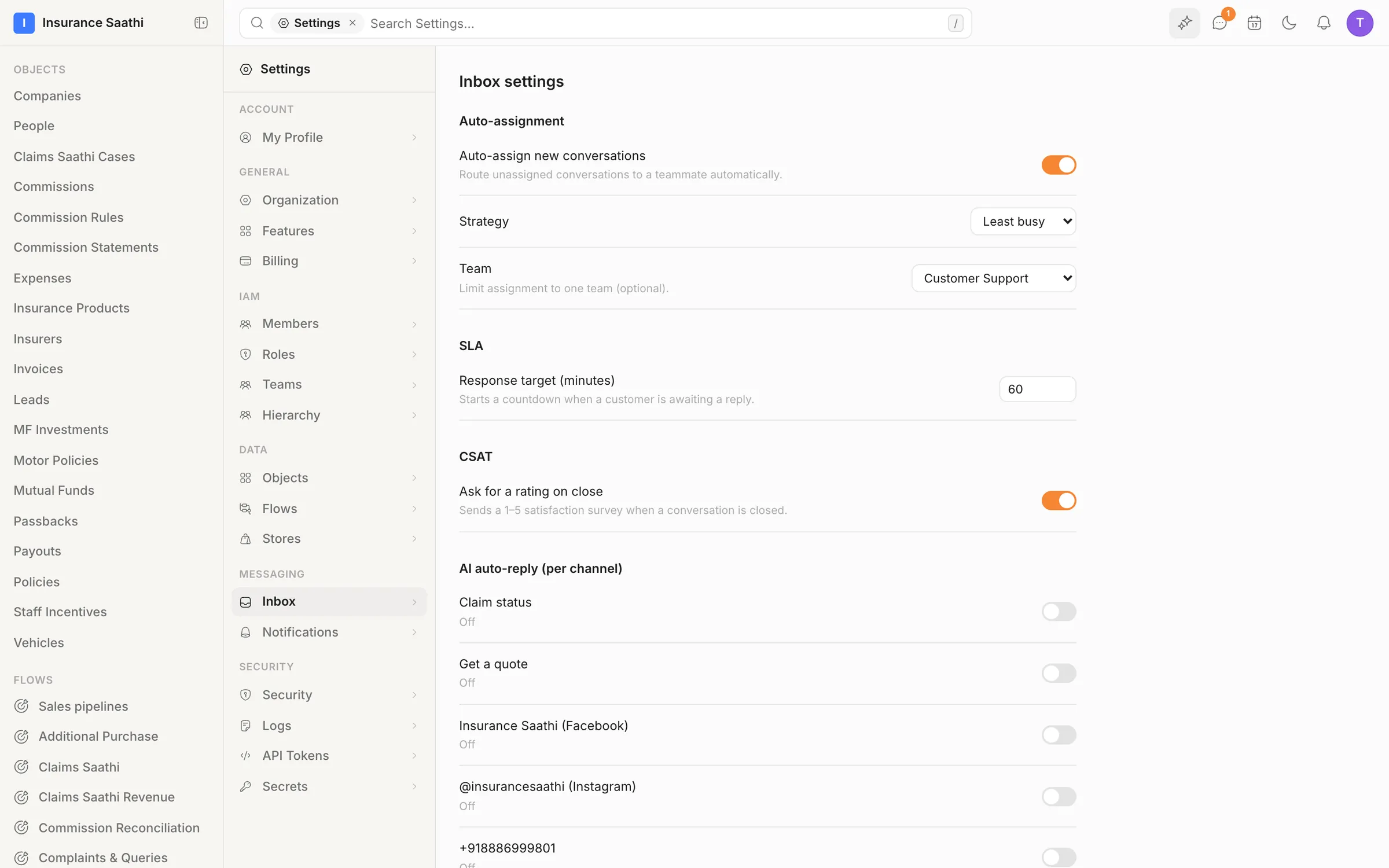 Inbox settings: auto-assign new conversations to the least-busy teammate on Customer Support, a 60-minute SLA response target, a CSAT survey on close, and AI auto-reply switchable per channel.